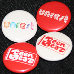 UNREST and Tee-Beat 26th Anniversary badges